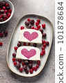 delicious ice cream with berry filling in ceramic plate. Summer refreshing ice cream dessert. vertical image 101878684
