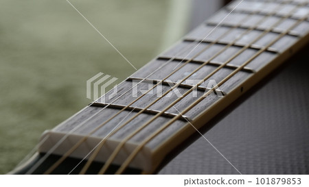 acoustic guitar neck and strings 101879853