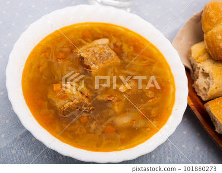 Soup of cabbage with boiled vegetables, pork broth and sour cream Soup of cabbage with boiled vegetables, pork broth and sour cream 101880273