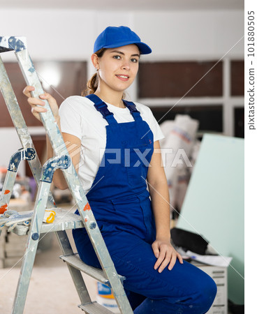 Portrait of young woman builder in apartment Portrait of young woman builder in apartment 101880505