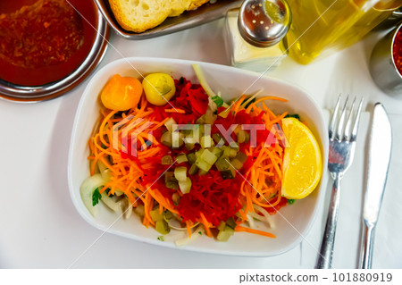Seasonal vegetable salad with carrot and cucumber 101880919
