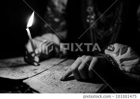 Ukrainian woman reading ancient book - Bible. 19th century,prayers psalms Ukrainian woman reading ancient book - Bible. 19th century,prayers psalms 101881475