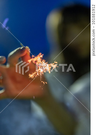 girl enjoying fireworks girl enjoying fireworks 101881912