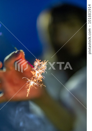 girl enjoying fireworks girl enjoying fireworks 101881914