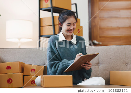 Small businesses SME owners female entrepreneurs working with parcel, e-business, marketing, online shop, sme Small businesses SME owners female entrepreneurs working with parcel, e-business, marketing, online shop, sme 101882151