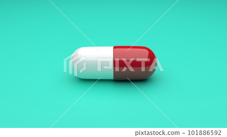White-Red pills isolated on green background. 101886592