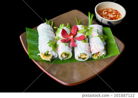 Vietnamese Pho spring roll with seafood, tofu, vegetables isolated on black background for a menu 101887122