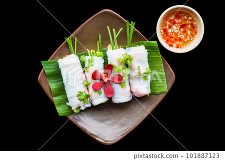 Vietnamese Pho spring roll with seafood, tofu, vegetables isolated on black background for a menu 101887123