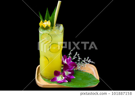 Fresh drink with Kumquat and citrus juice isolated on black background Fresh drink with Kumquat and citrus juice isolated on black background 101887158