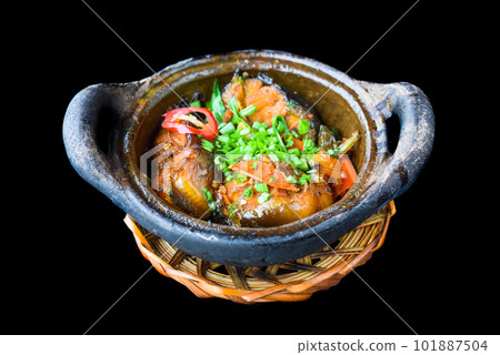 Vietnamese fried Mackerel fish with sauce on black background 101887504