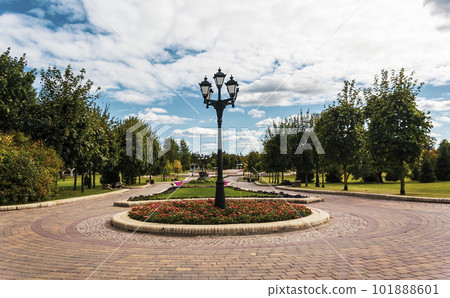Green city park in Europe. Lanterns and park benches 101888601