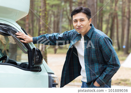 A man traveling in his proud camper A man traveling in his proud camper 101889036