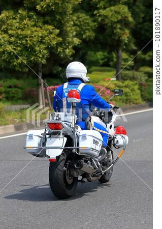 A police motorcycle on patrol 101890117