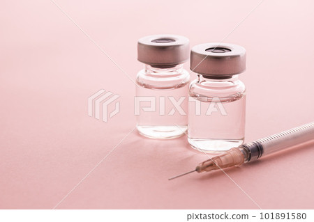 Syringe and vial medical image material on pink background 101891580