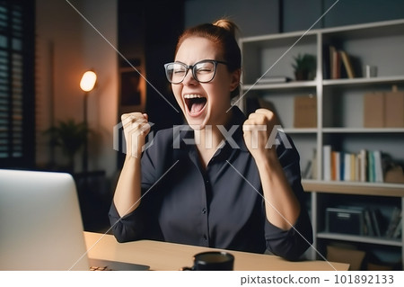 Excited businesswoman celebrating success in office. Successful businesswoman in eyeglasses sitting at table with laptop and raising hands up. Generative AI 101892133
