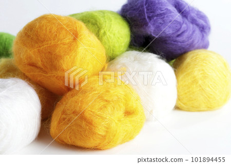 A ball of colorful mohair yarn taken with a white background A ball of colorful mohair yarn taken with a white background 101894455