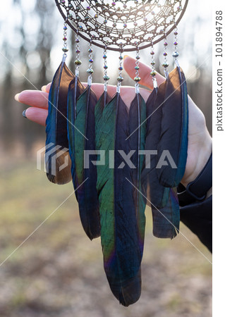 Handmade dream catcher with feathers threads and beads rope hanging 101894788