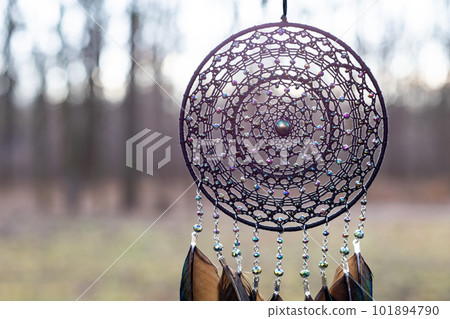 Handmade dream catcher with feathers threads and beads rope hanging Handmade dream catcher with feathers threads and beads rope hanging 101894790