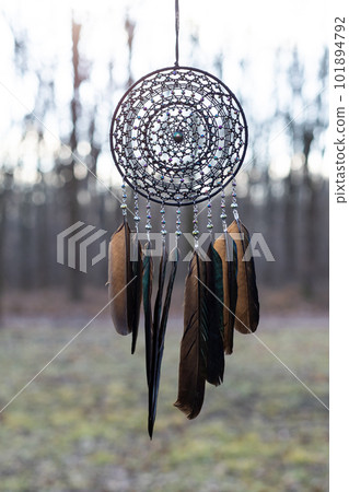 Handmade dream catcher with feathers threads and beads rope hanging Handmade dream catcher with feathers threads and beads rope hanging 101894792
