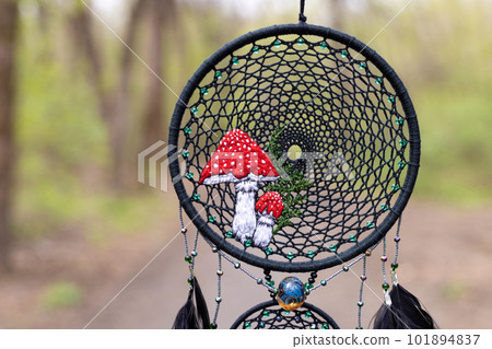 Handmade dream catcher with feathers threads and beads rope hanging 101894837