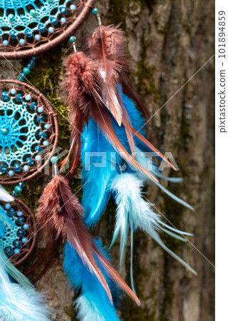 Handmade dream catcher with feathers threads and beads rope hanging Handmade dream catcher with feathers threads and beads rope hanging 101894859
