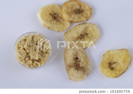 Gluten-free dried banana flour on white background Gluten-free dried banana flour on white background 101895759