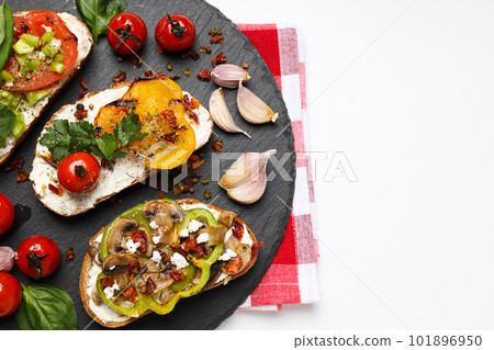 Toasts with grilled vegetables, space for text 101896950