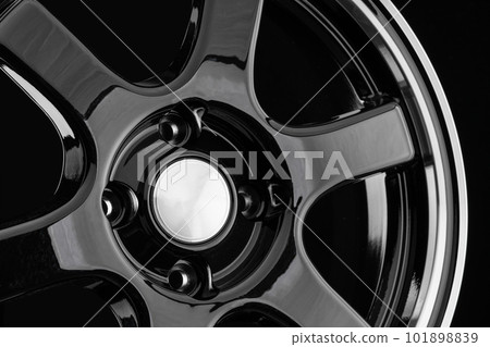 Black stylish sports car wheel close-up 101898839
