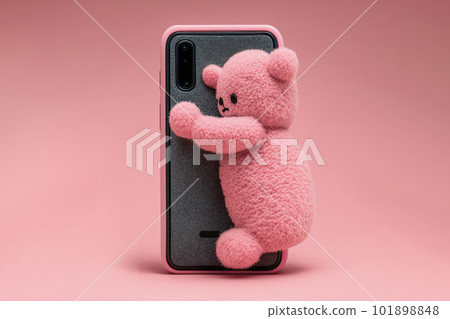 A pink bear is happy with a gift and hugs a brand new smartphone. a phone gift for loved ones and children Ai generated A pink bear is happy with a gift and hugs a brand new smartphone. a phone gift for loved ones and children Ai generated 101898848