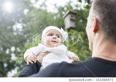 Dad with a small child. Father with a newborn daughter Dad with a small child. Father with a newborn daughter 101898971