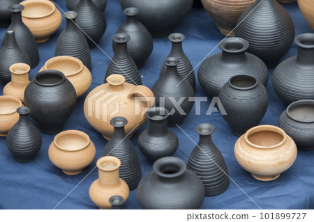 Clay vessels of different colors. Ceramics Clay vessels of different colors. Ceramics 101899727