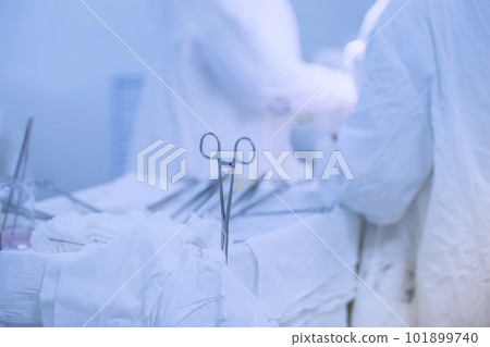 Background hands of the doctor do the surgery. Operating theater 101899740