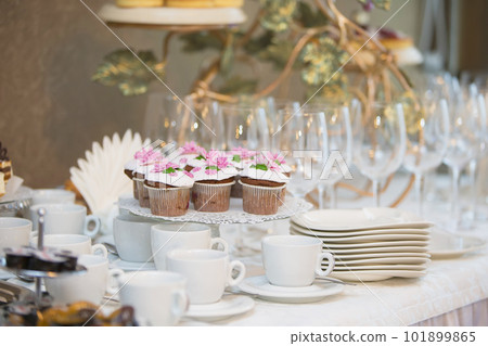 Table with dishes and buffet food 101899865