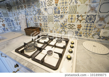 Gas built-in stove in the kitchen 101899873