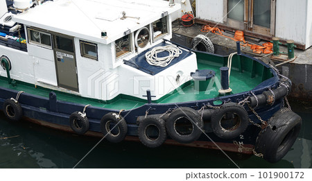 Work boat anchored in the harbor 101900172