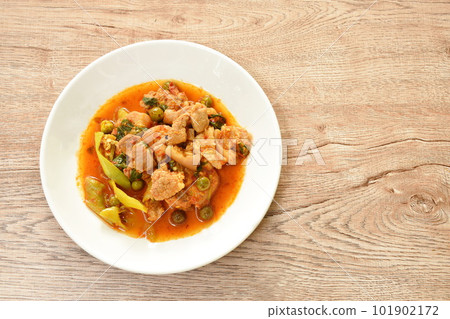 spicy stir fried slice pork leg with eggplant curry on plate  101902172