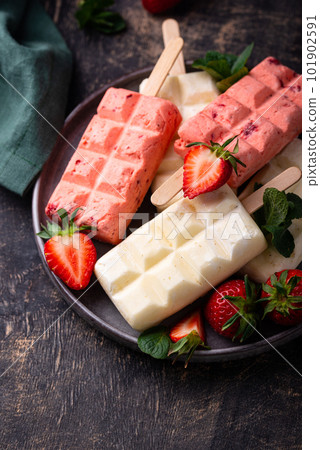 Strawberry ice cream pop sicle with mint Strawberry ice cream pop sicle with mint 101902591