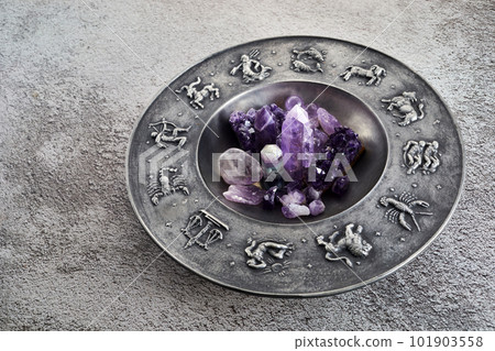 Crystals for healing, fortune telling and astrologhy circle on grey background. Esoteric and life coaching concept. Crystals for healing, fortune telling and astrologhy circle on grey background. Esoteric and life coaching concept. 101903558