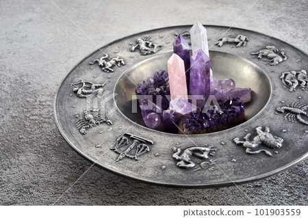 Crystals for healing, fortune telling and astrologhy circle on grey background. Esoteric and life coaching concept. Crystals for healing, fortune telling and astrologhy circle on grey background. Esoteric and life coaching concept. 101903559