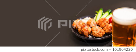 Karaage and beer are classic menu items at izakaya Karaage and beer are classic menu items at izakaya 101904220