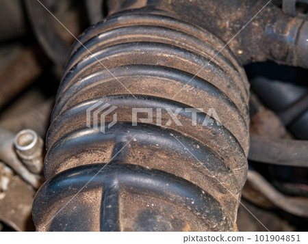 Rubber pipe of the exhaust system of a car engine. Rubber pipe of the exhaust system of a car engine. 101904851