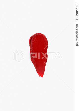 Smear and texture of lipstick or acrylic paint isolated on white background. Cream makeup texture. Bright red color cosmetic product brush stroke swipe sample Smear and texture of lipstick or acrylic paint isolated on white background. Cream makeup texture. Bright red color cosmetic product brush stroke swipe sample 101905489