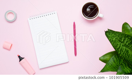 Creative flat lay mockup design of workspace. Top view composition with white to do list, cup coffee, succulents and stationery on pink background Creative flat lay mockup design of workspace. Top view composition with white to do list, cup coffee, succulents and stationery on pink background 101905509