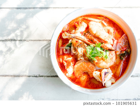 Famous food in Thailand. Tom Yum Kung on table with copy space Famous food in Thailand. Tom Yum Kung on table with copy space 101905631