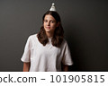 Calm relaxed teen girl standing wiht badminton shuttlecock on her head 101905815