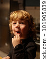 portrait of a little boy. He is surprised 101905839