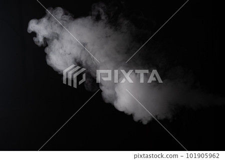 Cloud of white smoke on a black background closeup Cloud of white smoke on a black background closeup 101905962