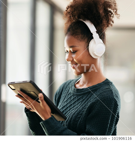 African american student woman wearing sweater and headphones to African american student woman wearing sweater and headphones to 101906116