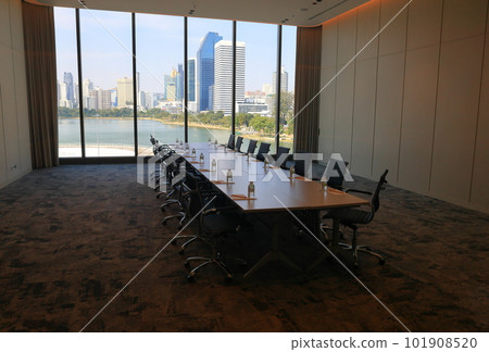 Empty modern boardroom, meeting room or conference room with city view background. Empty modern boardroom, meeting room or conference room with city view background. 101908520