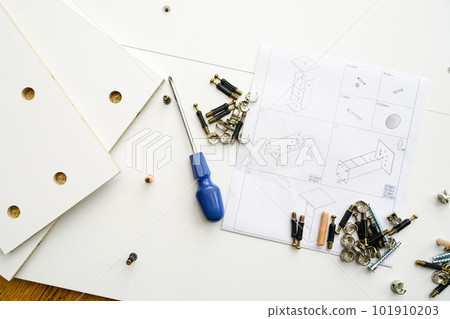 New white laminated chipboard furniture self mounting set with fitting kit and assembly diagram New white laminated chipboard furniture self mounting set with fitting kit and assembly diagram 101910203